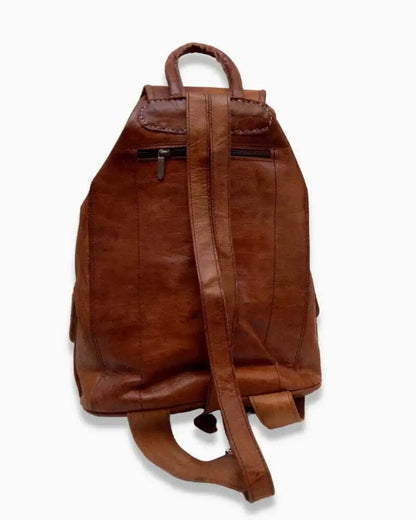 Handcrafted Moroccan leather bag purse in natural brown, featuring traditional stitching and a minimalist design, made from eco-friendly materials