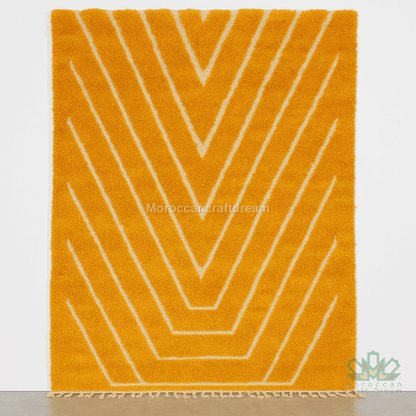 Mustard rug with white geometric pattern on a white background