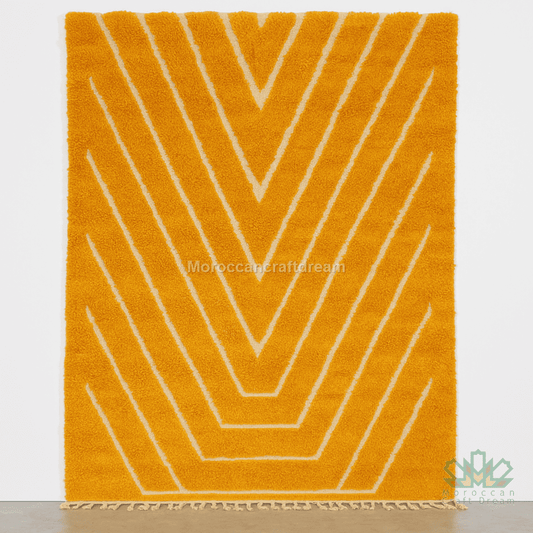 Mustard rug with white geometric pattern on a white background