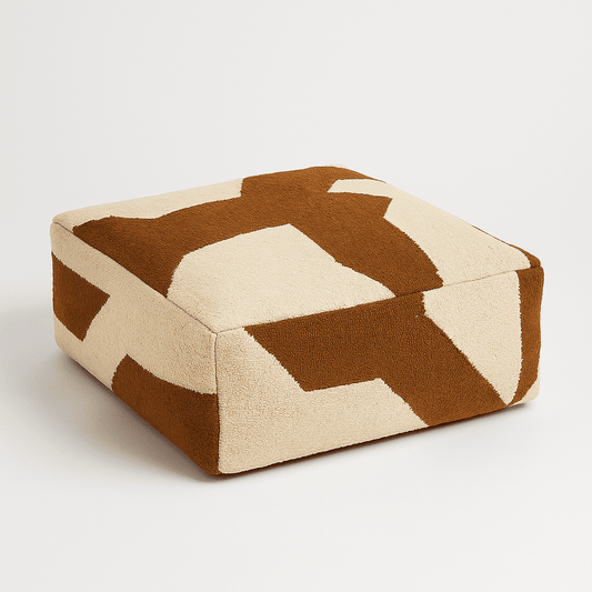 Rectangular ottoman with brown and beige geometric pattern on a white background