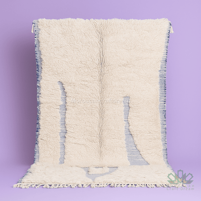 Textured white rug with blue accents on a purple background