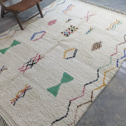 Berber area rugs and Moroccan carpets featuring traditional designs, handcrafted from high-quality materials for authentic home decor.