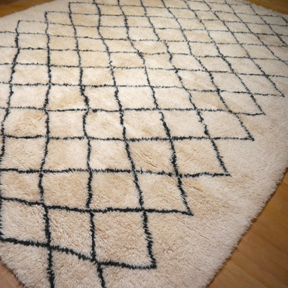 Berber area rugs and Moroccan carpets featuring traditional designs, handcrafted from high-quality materials for authentic home decor.