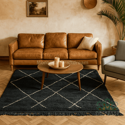 Living room with brown leather sofa, wooden coffee table, and dark rug.