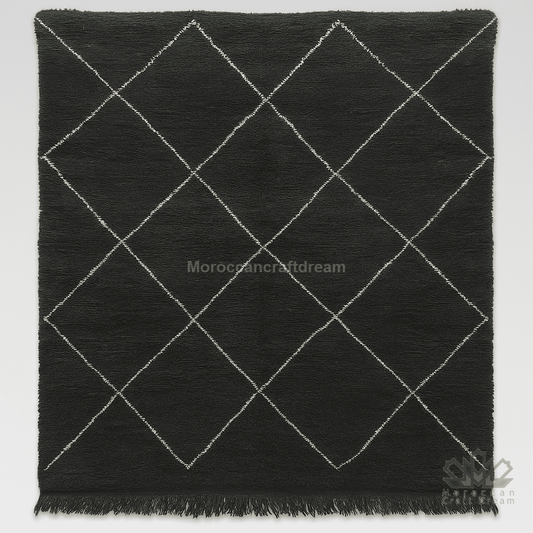 Black rug with white diamond pattern on a gray background