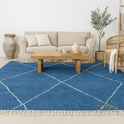 Blue geometric rug with white lines in a living room setting.