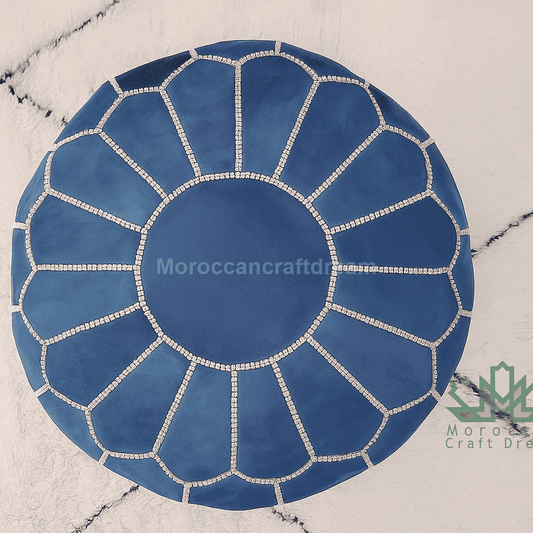 Blue circular rug with white geometric pattern on a light background