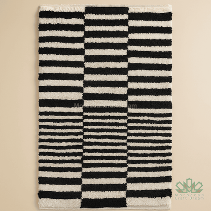 Black and white striped rug on a beige background