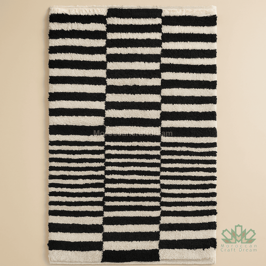 Black and white striped rug on a beige background