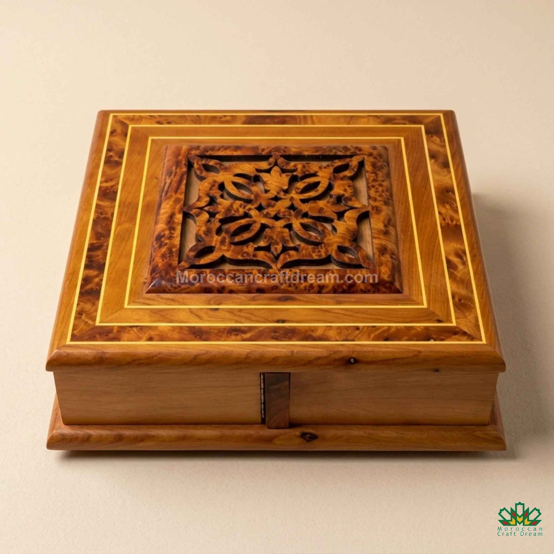 Traditional Moroccan Thuya wood craftsmanship in a minimalist boutique setting.