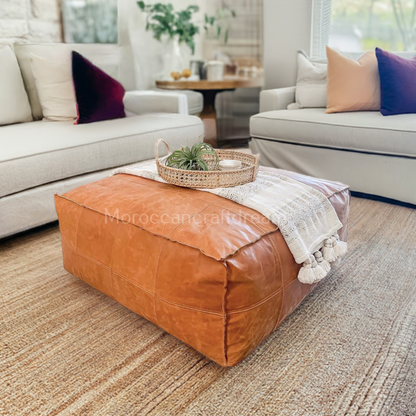 Moroccan leather coffee table caramel ottoman, combining elegance and durability in one versatile furniture piece.