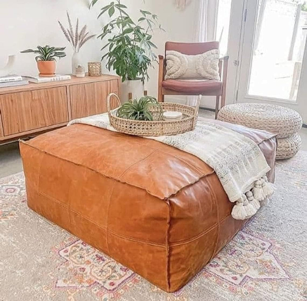 caramel larhge pouf leather coffee table available in square & rectangulare shapes, ideal for boho and modern home decor