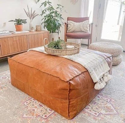 caramel larhge pouf leather coffee table available in square & rectangulare shapes, ideal for boho and modern home decor