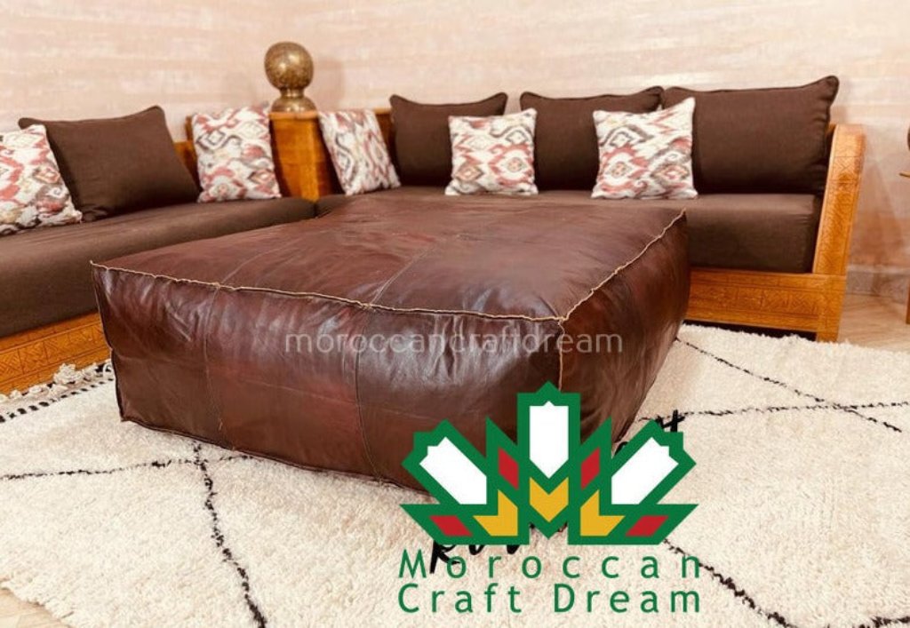 Large Brown and chocolate Classic leather ottoman coffee table, a modern addition that combines elegance and functionality.