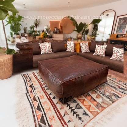 Chocolate Brown Large coffee table ottoman, adding style and versatility to spacious living rooms with a luxurious touch.