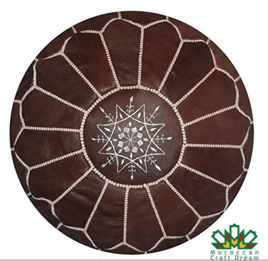 Traditional chocolateMoroccan leather ottoman, perfect as a timeless piece of decor for the living room or bedroom.