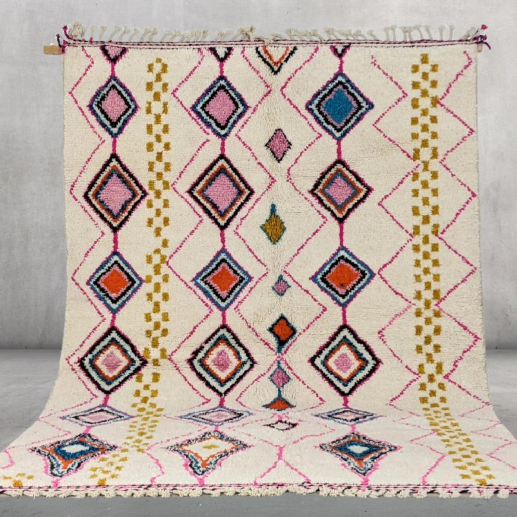 Berber area rugs and Moroccan carpets featuring traditional designs, handcrafted from high-quality materials for authentic home decor.