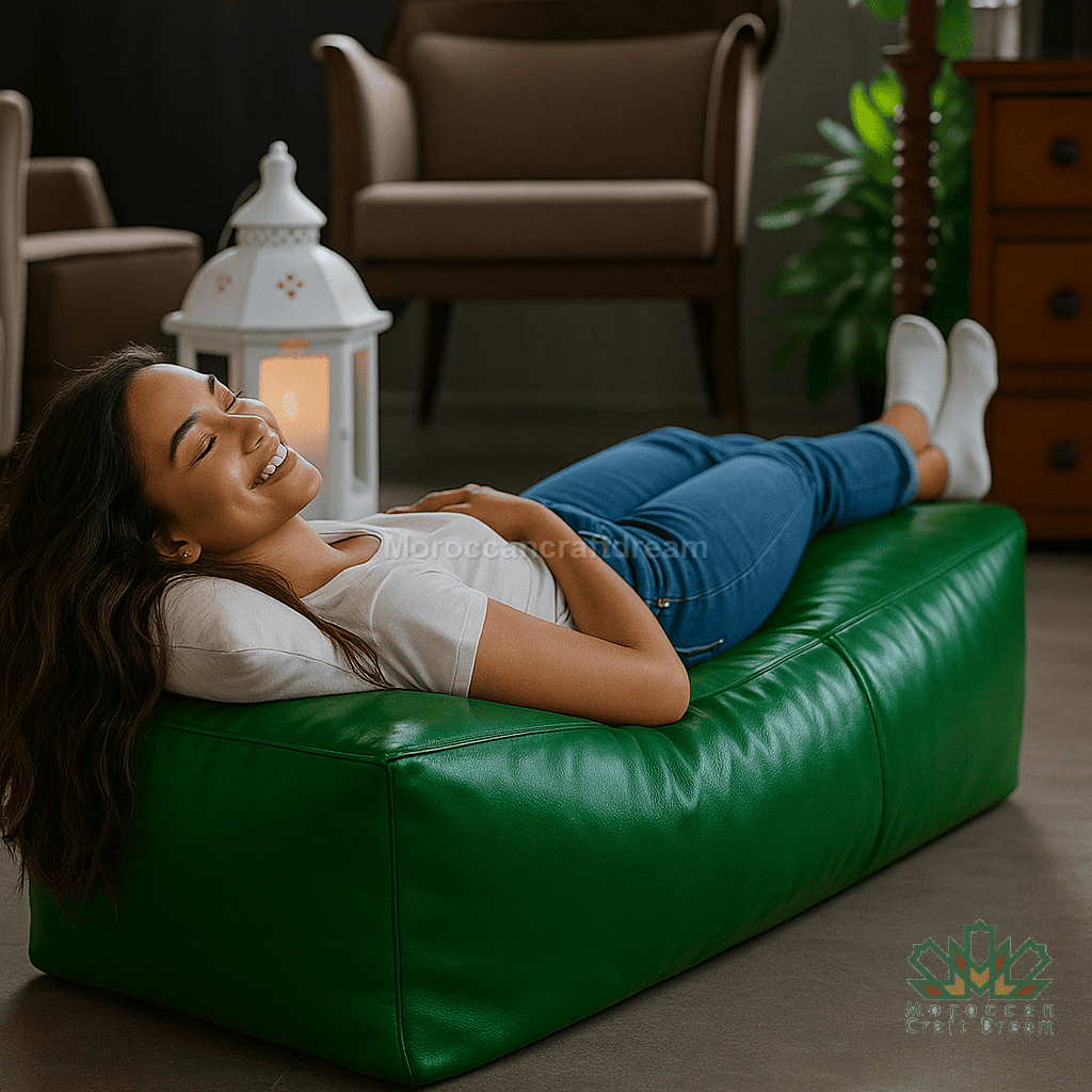 Woman lying on a green leather ottoman in a cozy living room.