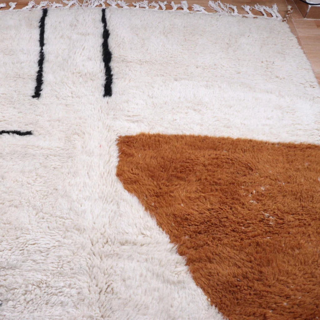 Berber area rugs and Moroccan carpets featuring traditional designs, handcrafted from high-quality materials for authentic home decor.
