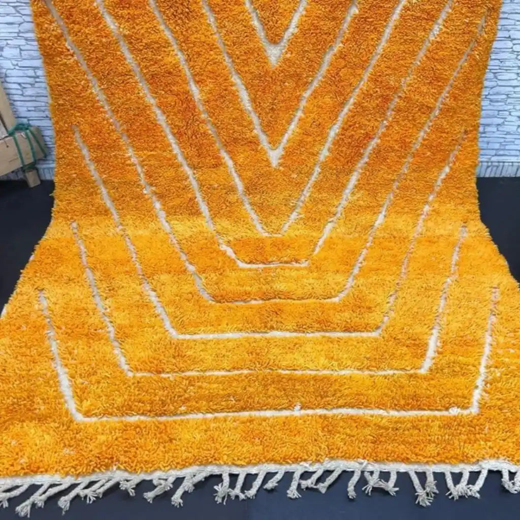 Berber area rugs and Moroccan carpets featuring traditional designs, handcrafted from high-quality materials for authentic home decor.