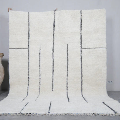 Berber area rugs and Moroccan carpets featuring traditional designs, handcrafted from high-quality materials for authentic home decor.
