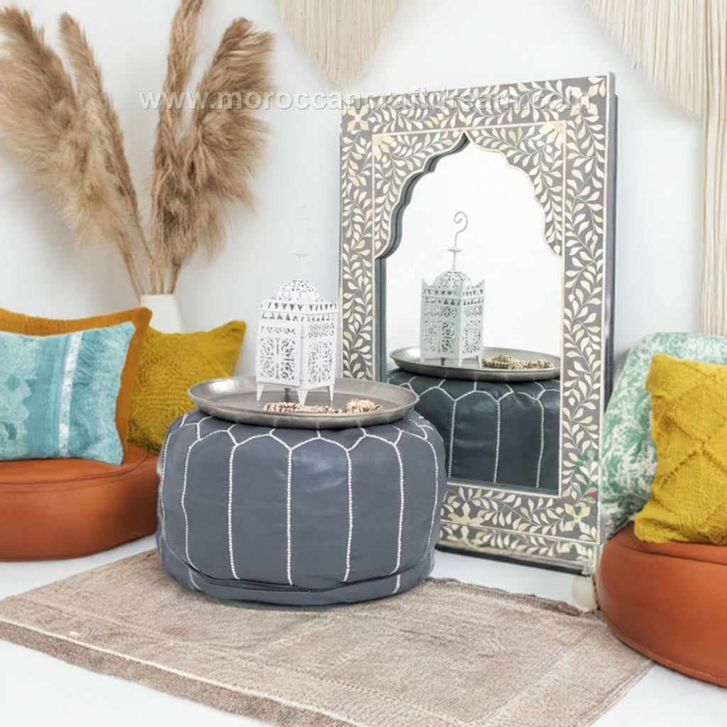 Elegant Grey Moroccan leather ottoman designed to add a touch of sophistication and versatility to any room.