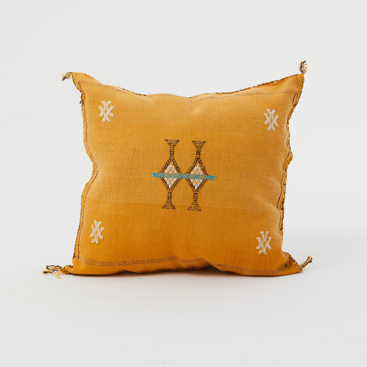 Moroccan mustard hand-loomed pillow cover showcasing traditional craftsmanship