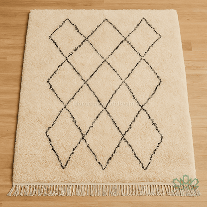 Beige rug with black diamond pattern on a wooden floor