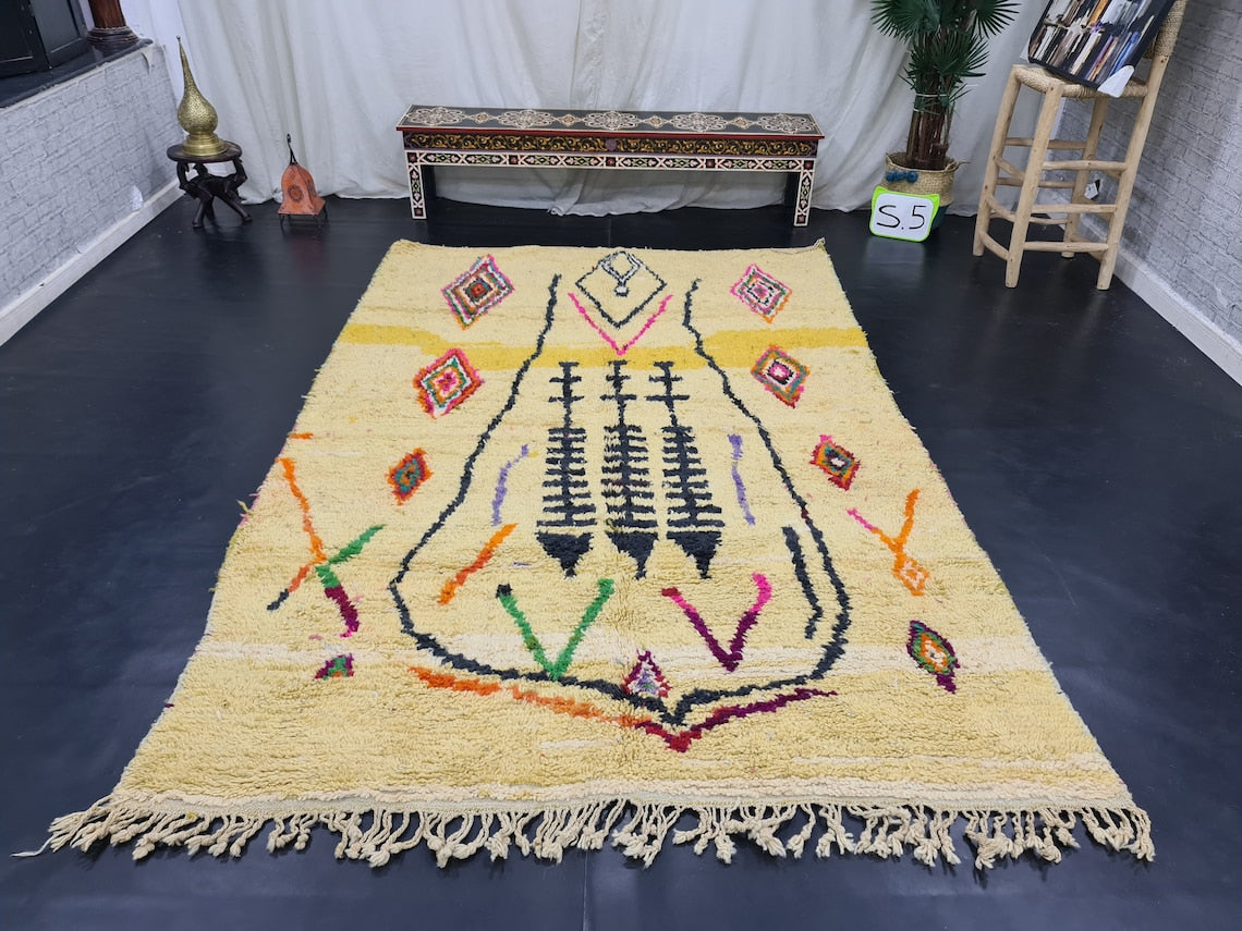 Berber area rugs and Moroccan carpets featuring traditional designs, handcrafted from high-quality materials for authentic home decor.