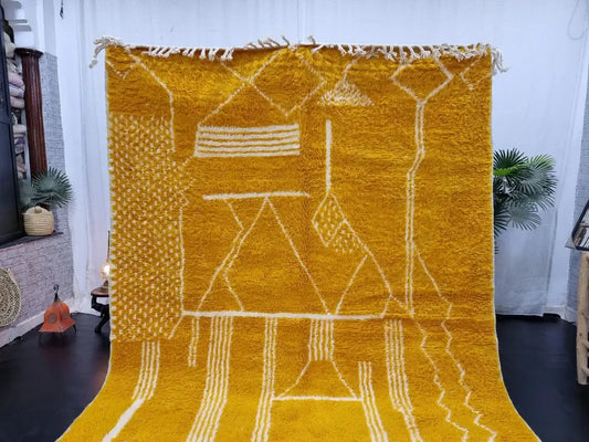 Mustard Berber area rugs and Moroccan carpets featuring traditional designs, handcrafted from high-quality materials for authentic home decor.