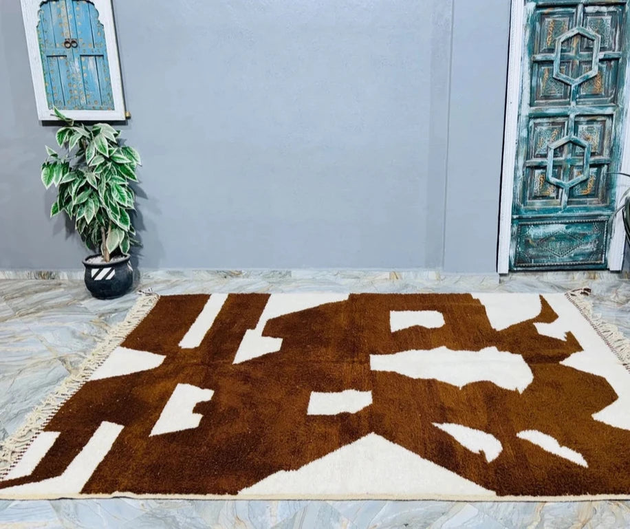 Berber area rugs and Moroccan carpets featuring traditional designs, handcrafted from high-quality materials for authentic home decor.