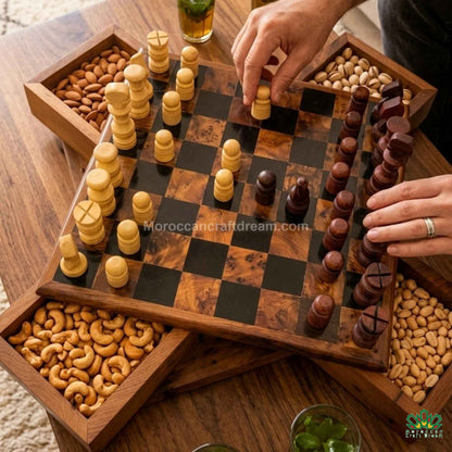 Checkered Elegant tabletop display featuring a Moroccan Thuya wood box and amber beads.