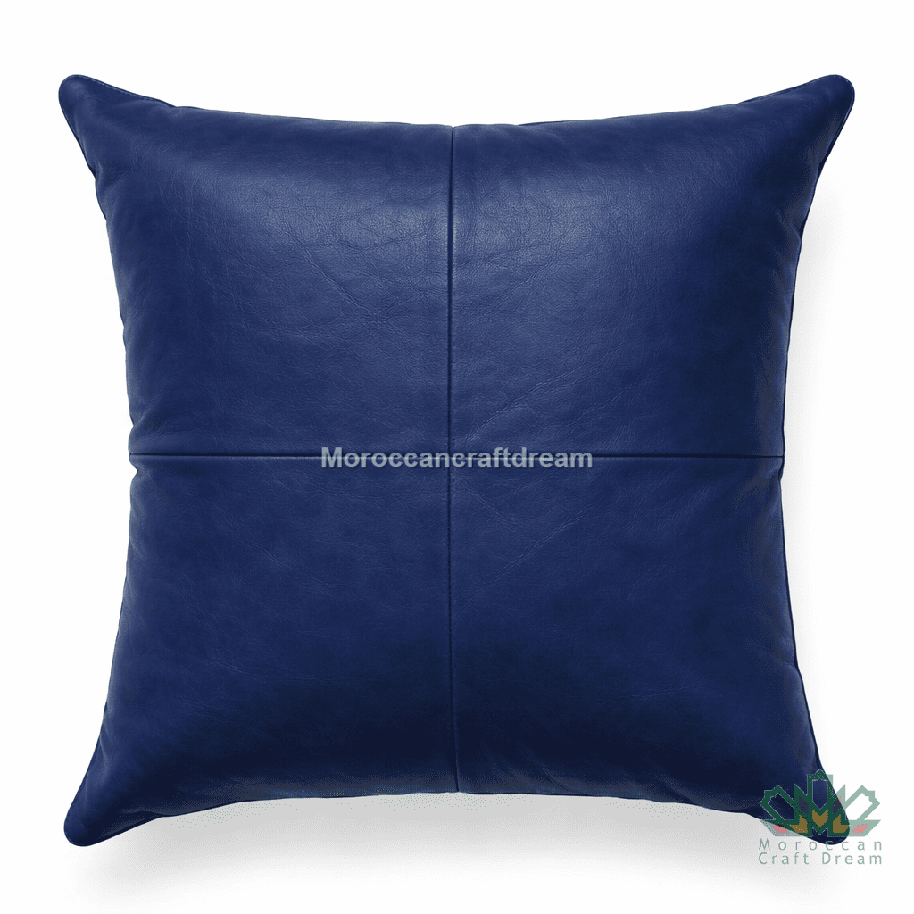Navy Blue leather pillow on a white background with 'MoroccanCraftDream' branding.