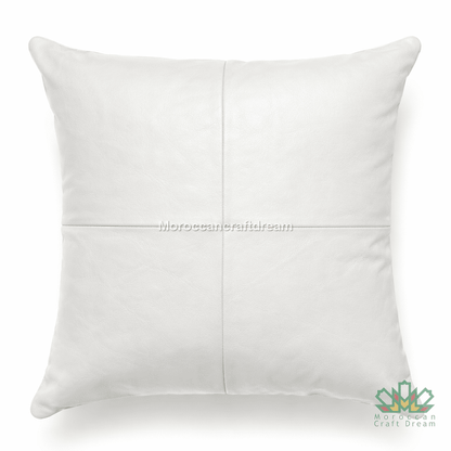 White leather pillow on a white background with 'Moroccan Craft Dream' branding.