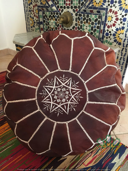 Elegant and functional Moroccan chocolate brown leather pouf ottoman in a classic design, suitable for modern and traditional interiors.