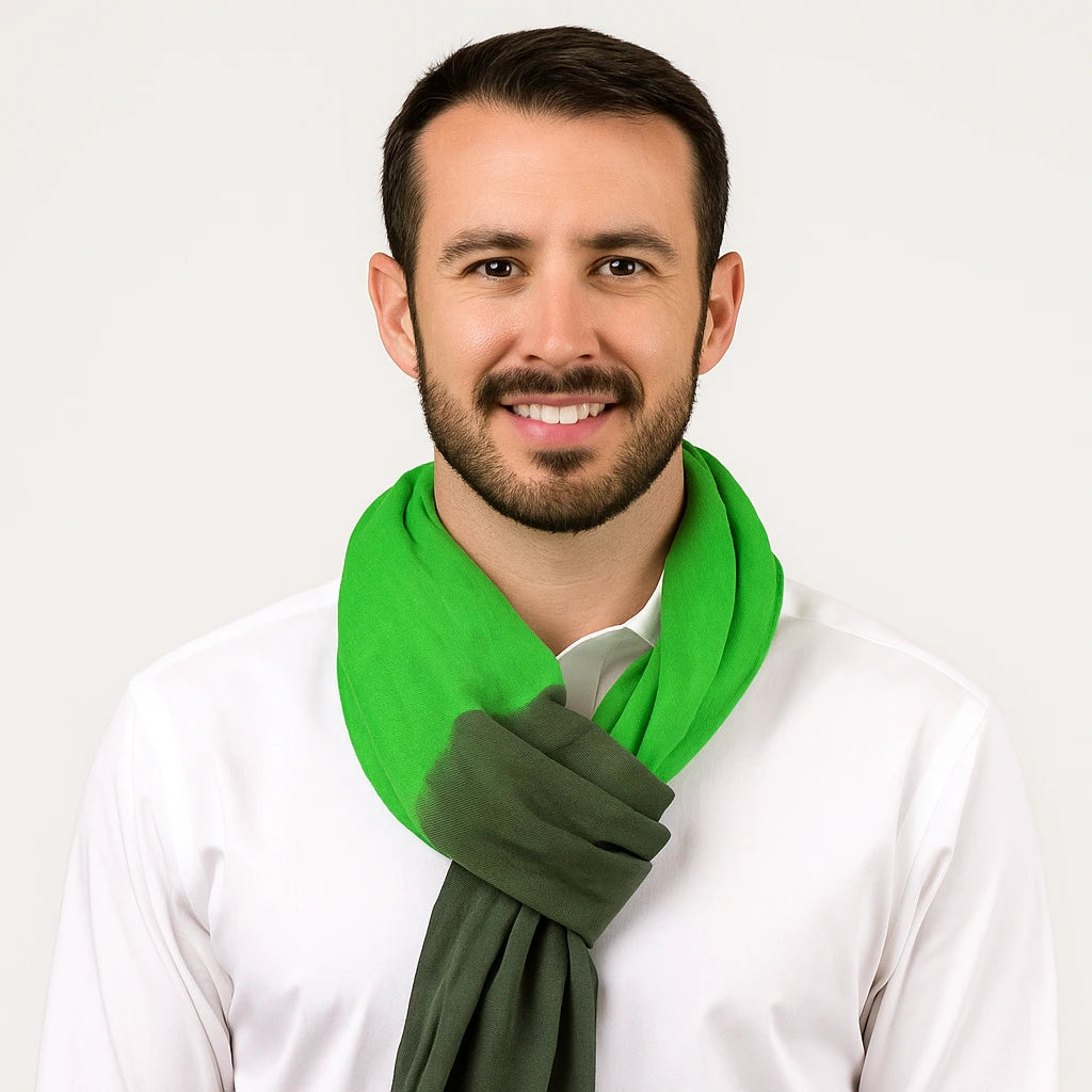 Man wearing a green scarf on a white background
