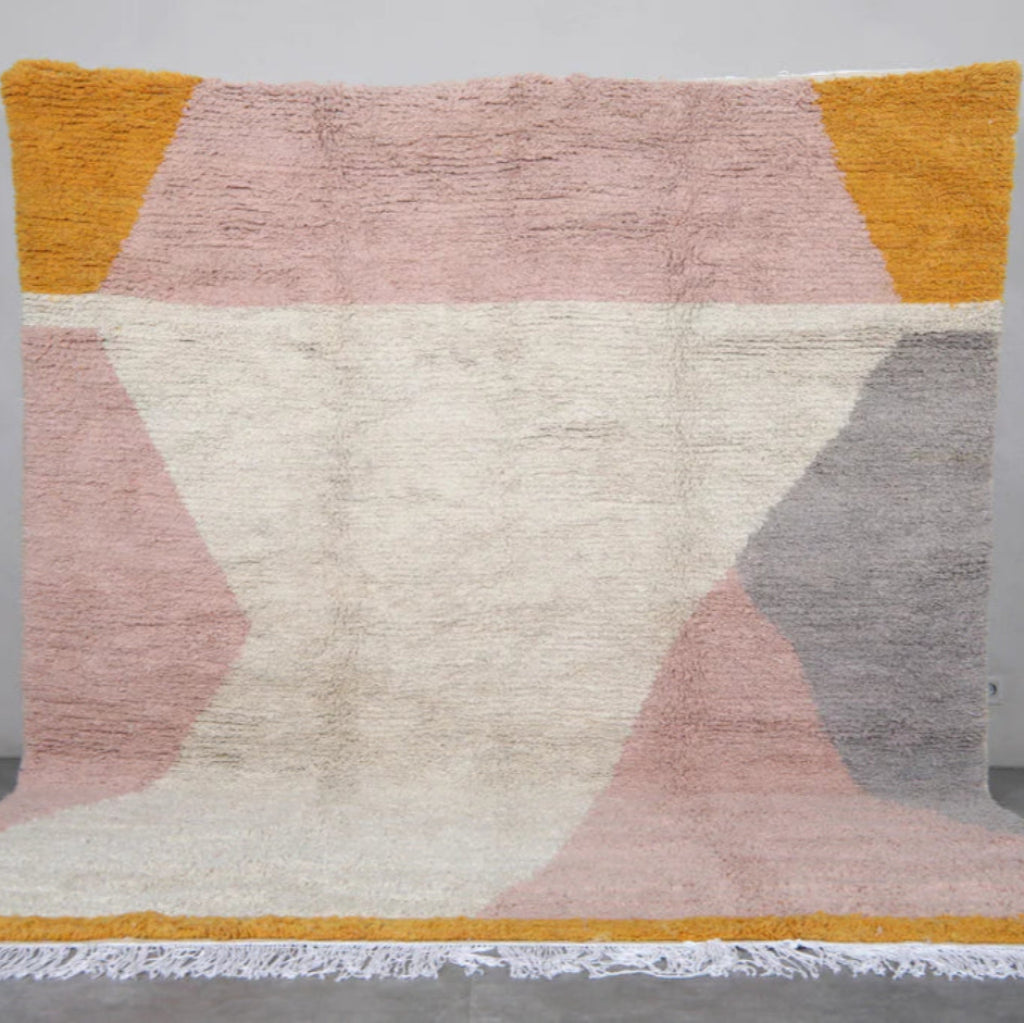 Berber area rugs and Moroccan carpets featuring traditional designs, handcrafted from high-quality materials for authentic home decor.