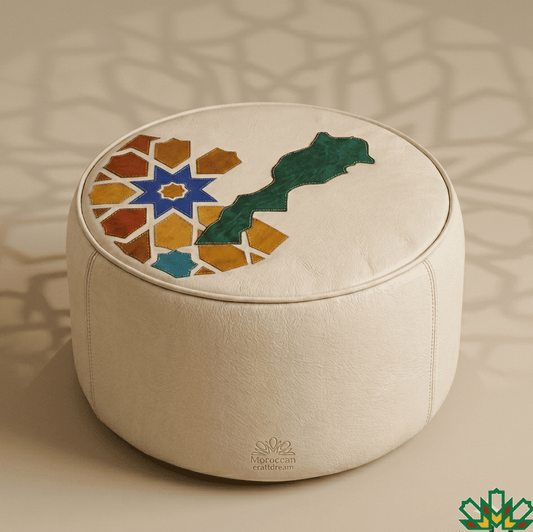 Round beige ottoman with moroccan Zellige motif and the map of the Kingdom of Morocco and 'Moroccan' branding on a beige background