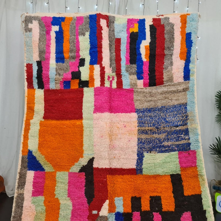 Berber area rugs and Moroccan carpets featuring traditional designs, handcrafted from high-quality materials for authentic home decor.