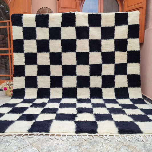 Berber area rugs and Moroccan carpets featuring traditional designs, handcrafted from high-quality materials for authentic home decor.