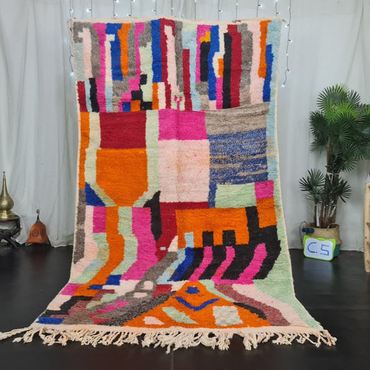 Berber area rugs and Moroccan carpets featuring traditional designs, handcrafted from high-quality materials for authentic home decor.