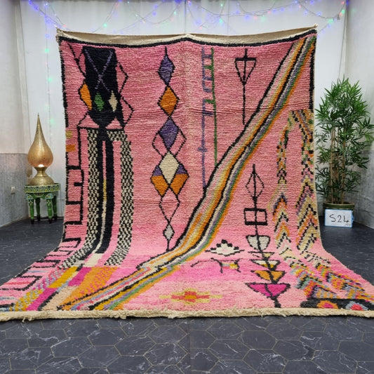 Berber area rugs and Moroccan carpets featuring traditional designs, handcrafted from high-quality materials for authentic home decor.