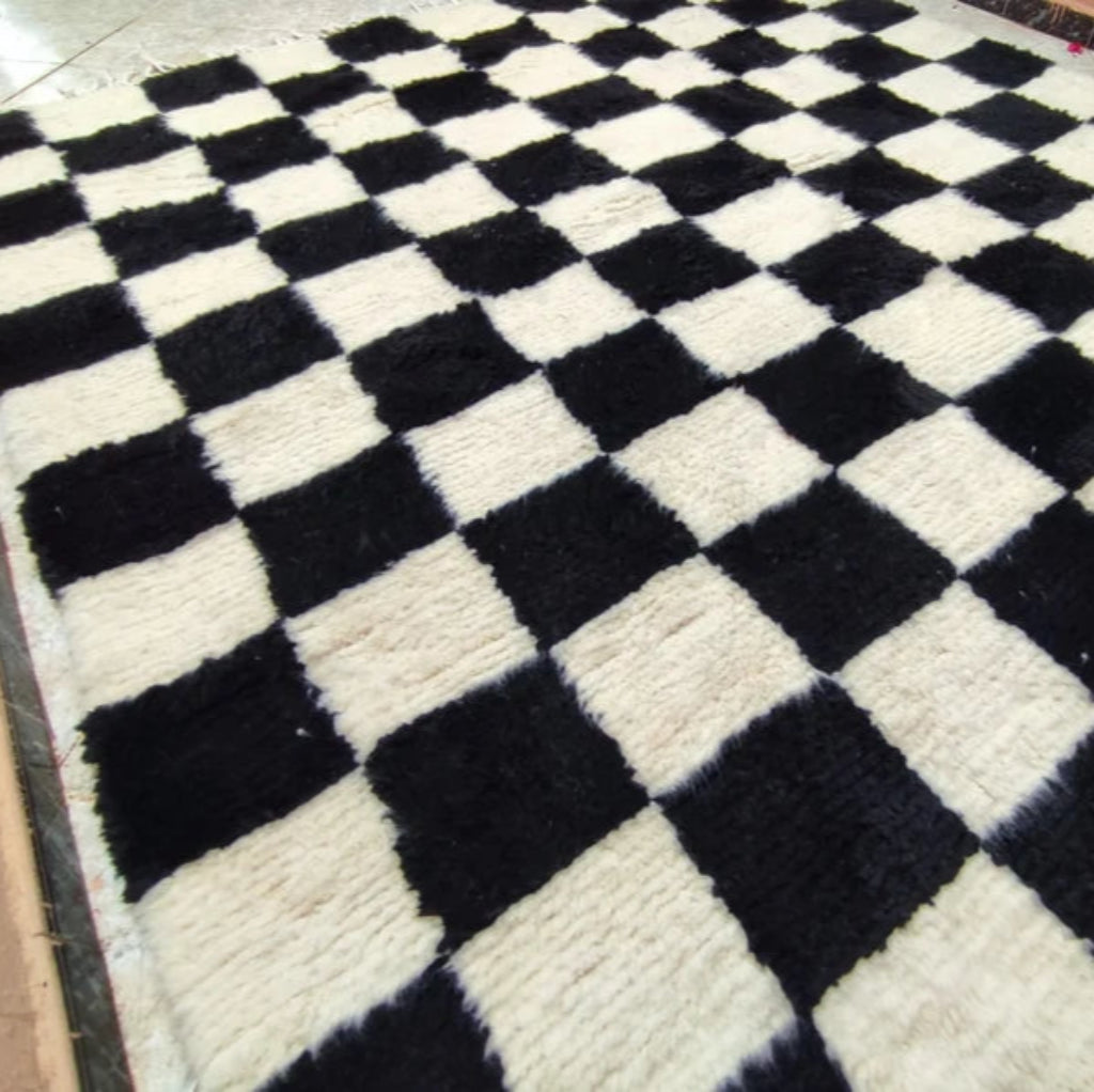 Berber area rugs and Moroccan carpets featuring traditional designs, handcrafted from high-quality materials for authentic home decor.