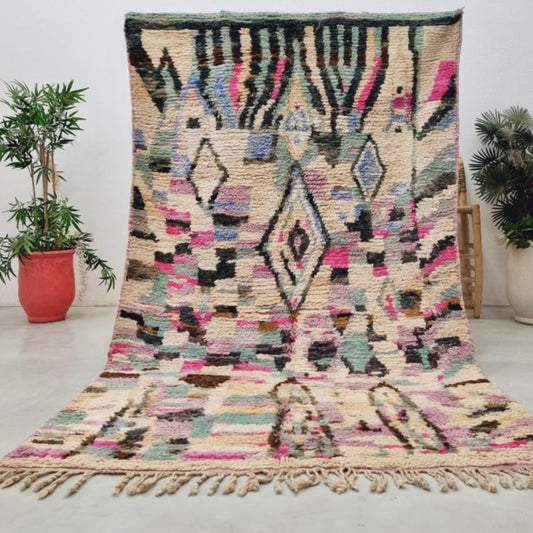 Berber area rugs and Moroccan carpets featuring traditional designs, handcrafted from high-quality materials for authentic home decor.