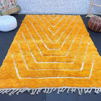 Berber area rugs and Moroccan carpets featuring traditional designs, handcrafted from high-quality materials for authentic home decor.
