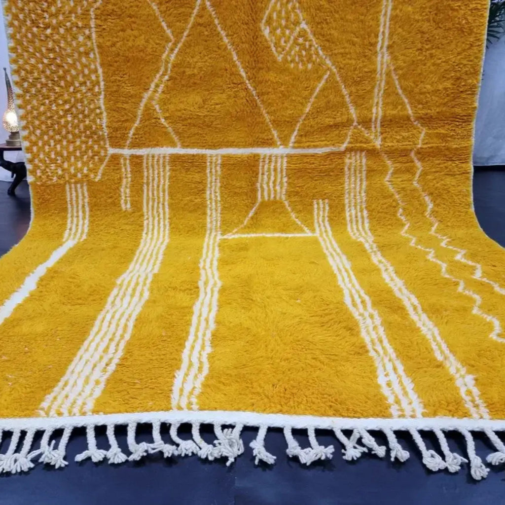 Berber area rugs and Moroccan carpets featuring traditional designs, handcrafted from high-quality materials for authentic home decor.