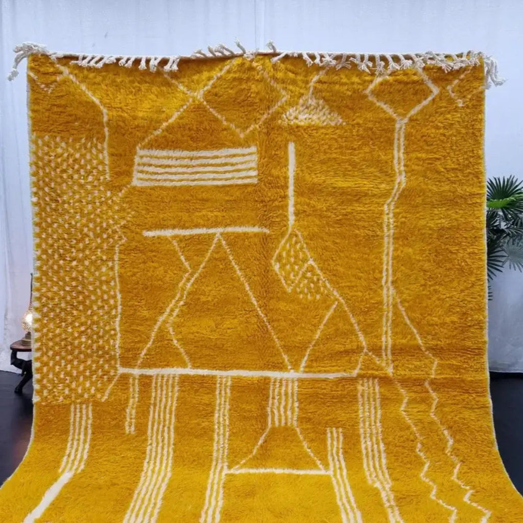 Mustard Berber area rugs and Moroccan carpets featuring traditional designs, handcrafted from high-quality materials for authentic home decor.