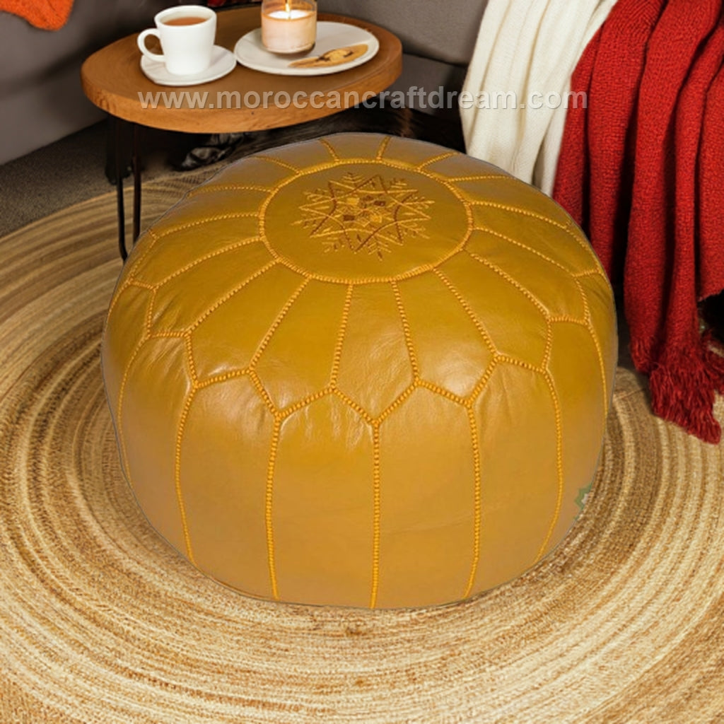 Mustard Handcrafted Moroccan leather pouf ottoman, versatile as a coffee table or foot stool, made from high-quality leather for a stylish and functional addition to any room decor.