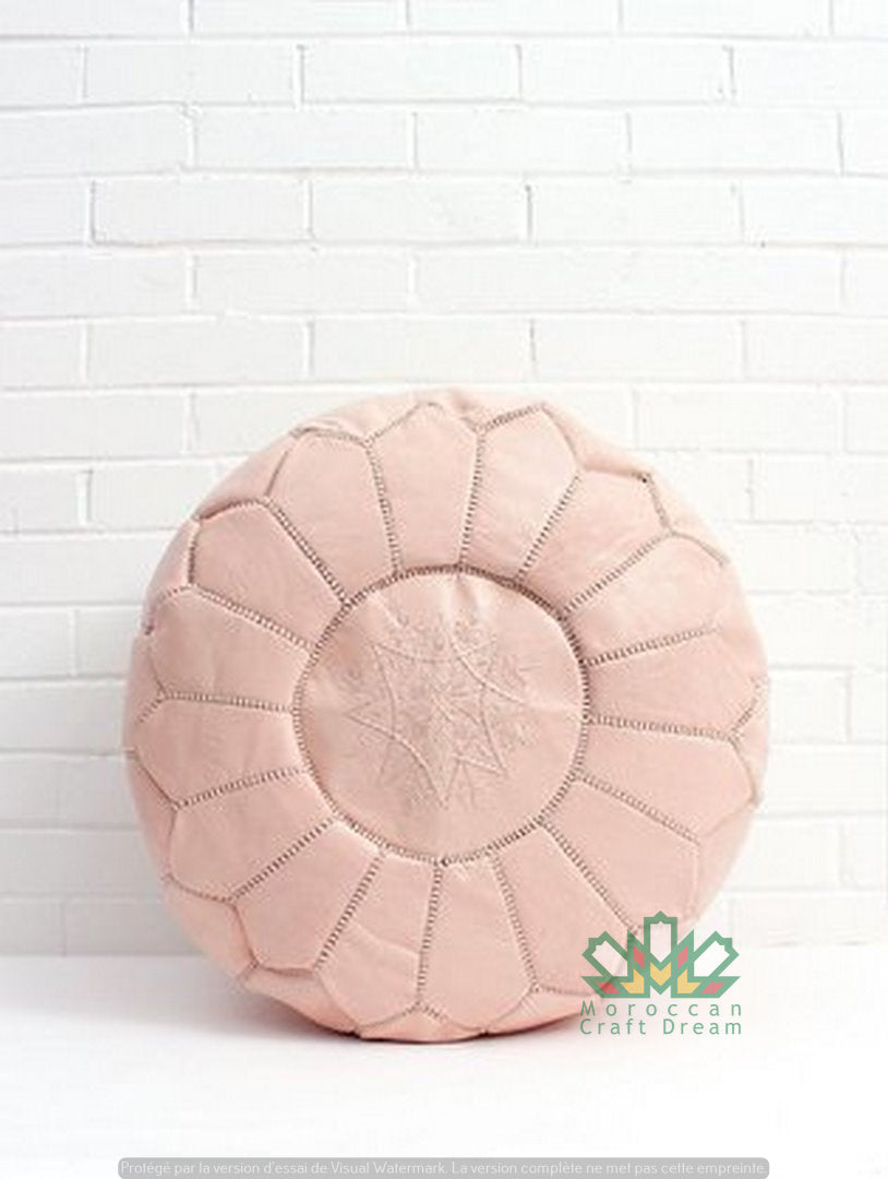 Nude Luxury Moroccan leather ottoman for living room decor, blending functionality with authentic Moroccan style.