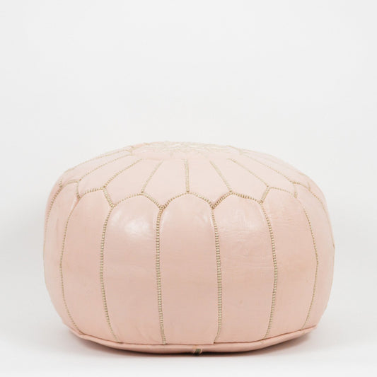 Genuine leather nude Moroccan pouf ottoman, handcrafted with traditional techniques for a stylish addition to any space.